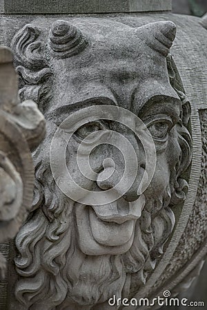 Sculpture of mysterious ancient creature in downtown of Potsdam, Germany, portrait, details Stock Photo