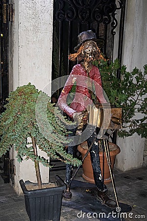 Sculpture of a photographer with an old camera in the Georgian restaurant in Tbilisi city in Georgia Editorial Stock Photo