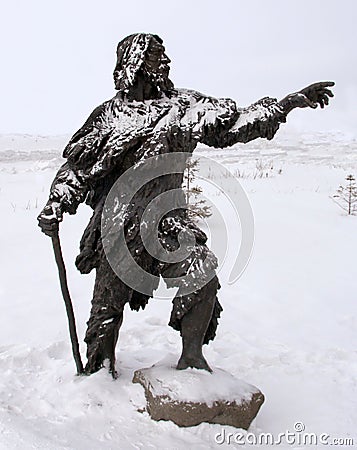 A sculpture of a prehistoric people, Archeopark, Khanty - Mansiysk, Russia Editorial Stock Photo