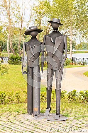 Sculpture `Promenade` by O. Epinger, in the Natalka park of Kiev Editorial Stock Photo