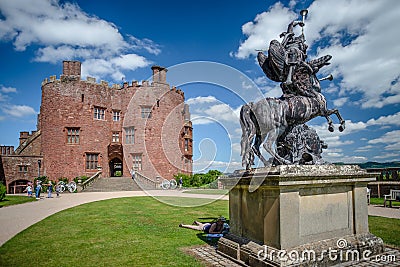 Sculpture and red brick tower, Powis Castle, Wales Editorial Stock Photo