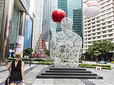 Sculpture Singapore soul from Jaume Plensa in the financial Cent Editorial Stock Photo