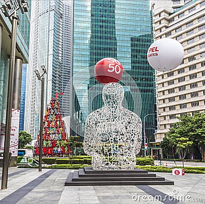 Sculpture Singapore soul from Jaume Plensa in the financial Cent Editorial Stock Photo