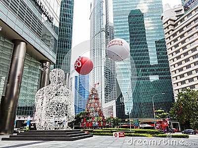 Sculpture Singapore soul from Jaume Plensa in the financial Cent Editorial Stock Photo