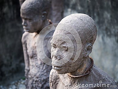 Sculpture of slaves in Stone Town, Zanzibar Stock Photo
