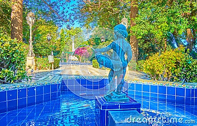 The sculpture on small fountain in Alameda Apodaca and Marques de Comillas Gardens in Cadiz, Spain Stock Photo