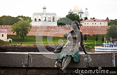 Sculpture of tired tourist near novgorod kremlin Stock Photo