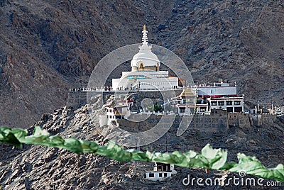 Sculpture View of ancient shanti stupa is a Buddhist white-domed stupa on a hilltop in Chanspa mountain from leh palace at Leh Lad Stock Photo