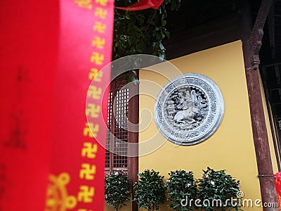 Sculpture on the wall inShanghai Editorial Stock Photo