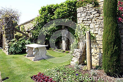 Sculptured marble table & statue at the Italian garden of Hever castle in England Stock Photo