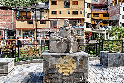 Sculptured stone art displayed in town of Aguas Caliente, Peru Editorial Stock Photo