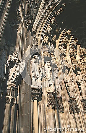 Sculptures on Cologne Cathedral, historic architecture background Stock Photo