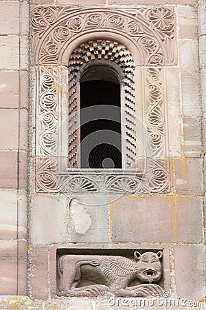 Sculpure in wall at the gothic abbey of Marmoutier in Alsace France Editorial Stock Photo