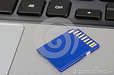 SD media card on a laptop computer Stock Photo