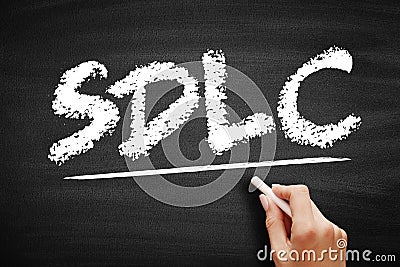 SDLC System Development Life Cycle - process for planning, creating, testing, and deploying an information system, acronym text on Stock Photo