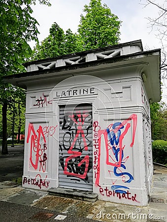 Art nouveau public toilets in a park in Turin, Italy, covered in graffiti Editorial Stock Photo
