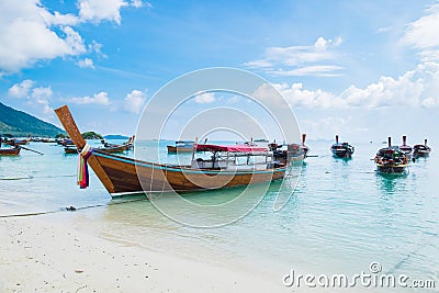 Sea beach with group long tail boat anchor coast Stock Photo