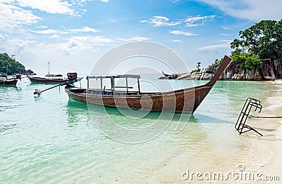 Sea beach group long tail boat anchor coast Stock Photo