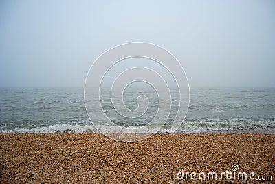 Sea beach in heavy fog Stock Photo