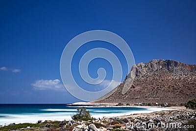 Sea, beach and mountains in the town of Stavros on the island of Crete, Greece Stock Photo