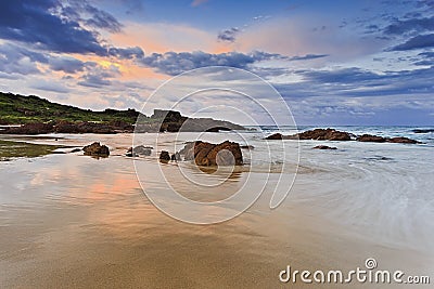 Sea Birubi Colours reflect sand Stock Photo