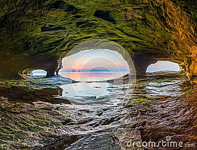 Sea Cave Sunset Stock Photo