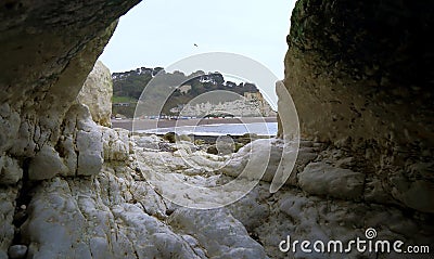 Sea cave under Beer Head in Devon Stock Photo