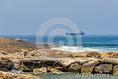 Sea coast and cargo ships Stock Photo