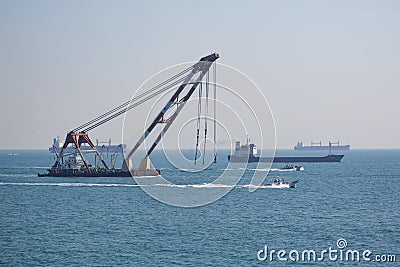 The sea crane on a tow Editorial Stock Photo