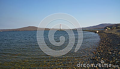 In the sea filled the road to the lighthouse, in the middle of the Sea Beach line passes Stock Photo