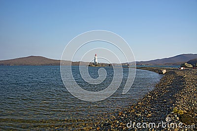 In the sea filled the road to the lighthouse, in the middle of the Sea Beach line passes Stock Photo