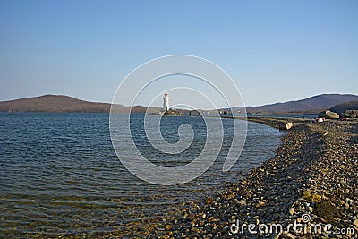 In the sea filled the road to the lighthouse, in the middle of the Sea Beach line passes Stock Photo