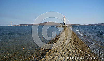 In the sea filled the road to the lighthouse, in the middle of the Sea Beach line passes Stock Photo