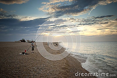Sea Fishing and Angling on the beach at Cley-next-the-Sea, North Norfolk, UK - August 2012 Editorial Stock Photo