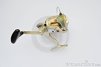 Sea fishing multiplier reel on a white background Stock Photo