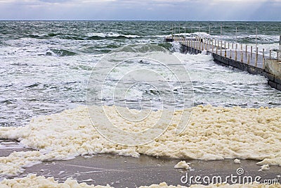 Sea foam and powerful sea splash wave Stock Photo