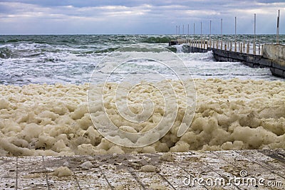 Sea foam and powerful sea splash wave Stock Photo
