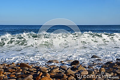 Sea foam from the waves in the bay of Akhlestyshev off the coast of the island Russian. Russia, Vladivostok Stock Photo