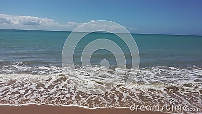 Sea with green-blue tones and clear sky Stock Photo