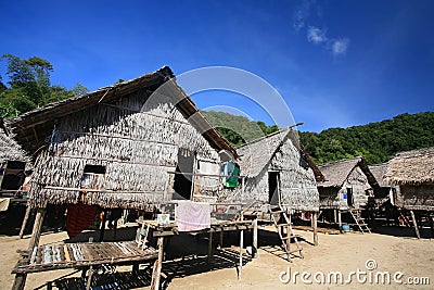 Sea Gypsy, Morgan, wooden houses against blue sky Stock Photo