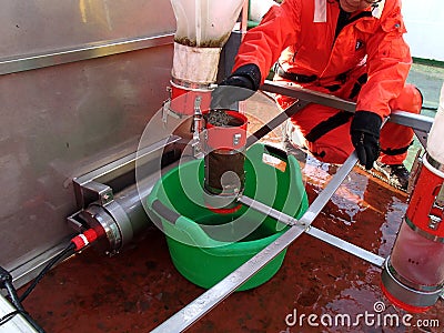 The Sea of Japan / Russia - December 01 2013: Taking the sample from epibenthic sledge net Editorial Stock Photo