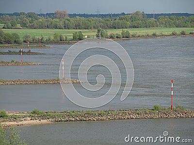 Sea marks on groynes at the river Rhine in Rees Stock Photo