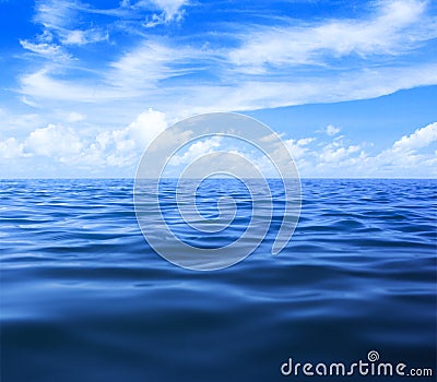 Sea or ocean water with blue sky and clouds Stock Photo