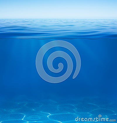 Sea or ocean water surface and underwater split by waterline Stock Photo