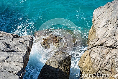 Sea rock cliff stones from above Stock Photo