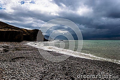 Sea and rocks in backlight Stock Photo