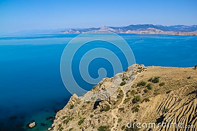 Sea and rocks landscape at Cape Meganom, the east coast of the peninsula of Crimea. Colorful background. Travelling concept. Stock Photo