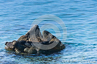 Sea rocks at morning near Destenika beach at Sithonia Stock Photo