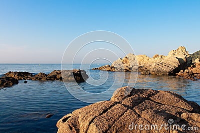 Sea and rocks. Morning seascape in Spain, Costa Brava. Blue sea and clear sky. Sea landscape of mediterranean coast Stock Photo