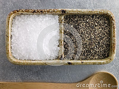 Sea Salt Crystals And Course Cracked Black Pepper Stock Photo